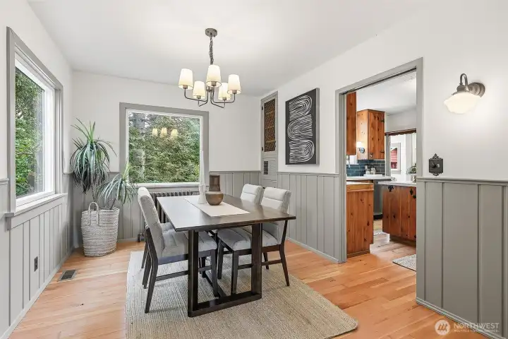 Dining room off front door entry and living room flows into the kitchen and back into the living room, the ideal circular floor plan layout.