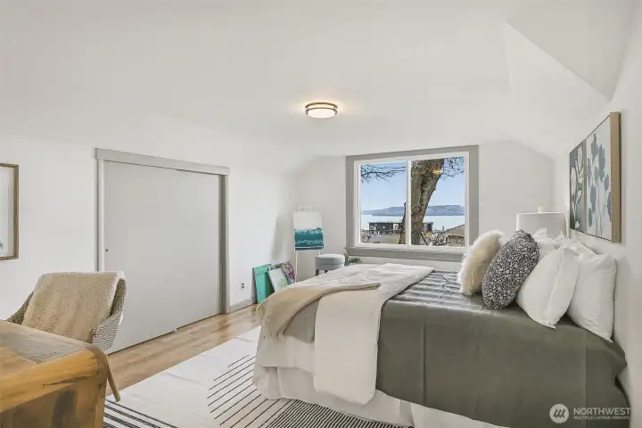 Huge 3rd bedroom (2 bedrooms + 3/4 bath on upper floor) continues to enjoy the amazing views from this home of the Puget Sound and Olympics.