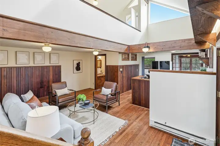 Open floor plan layout with a 3/4 bath, kitchen, living room and back room office / pantry on the main level -- top floor is the loft bedroom with attached 1/2 bath.