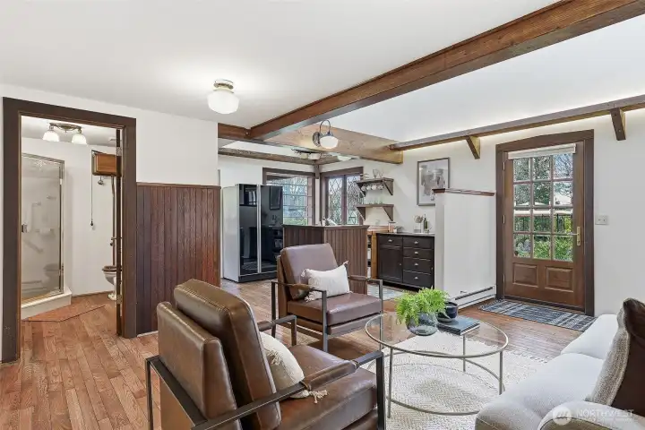 Open floor plan layout with a 3/4 bath, kitchen, living room and back room office / pantry on the main level -- top floor is the loft bedroom with attached 1/2 bath.