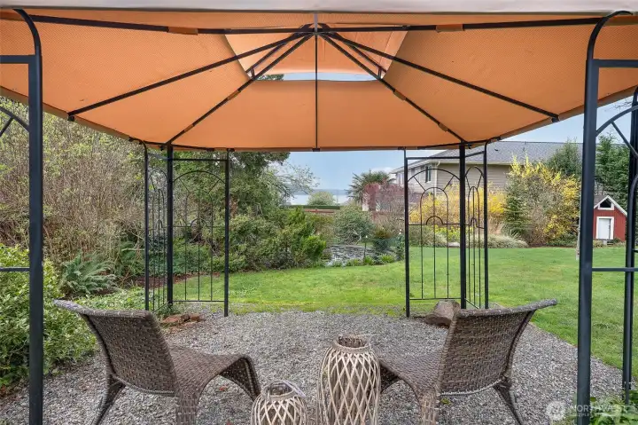 Enjoy the views and private yard space under the cover of this lovely gazebo.