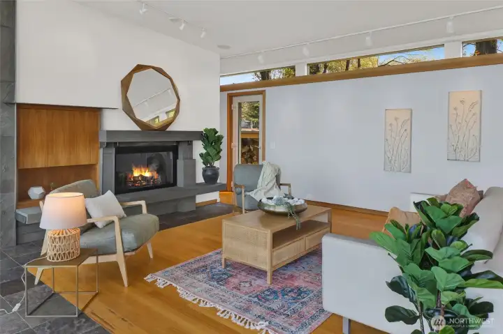 Wood burning fireplace and art wall
