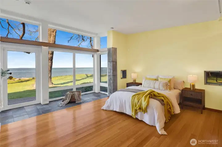 Main level primary bedroom...one of two in the home...faces the view