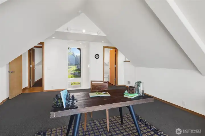 The third level has a full bathroom and ample storage space