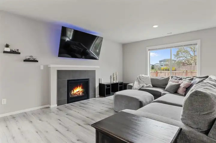 Gas powered fireplace and wood mantle