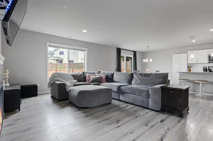 Open concept living room with tons of natural light.