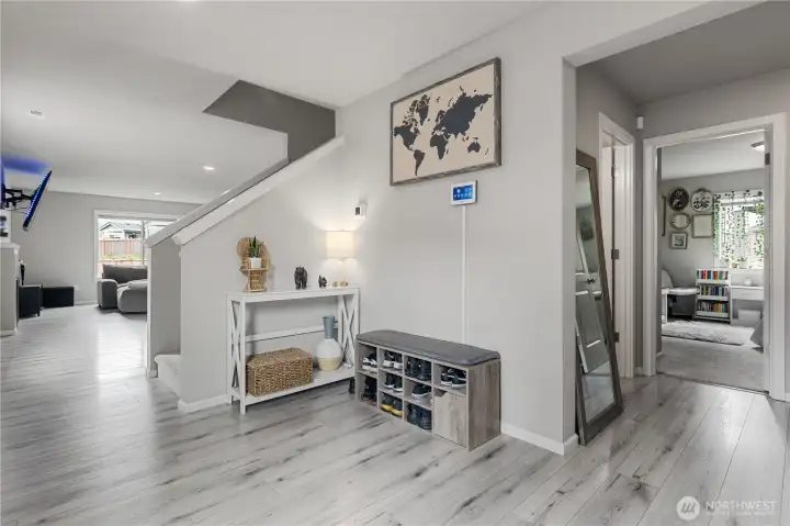 Spacious entryway with easy access to guest suite.