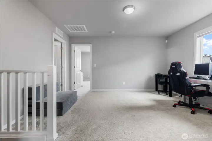 Upstairs loft for playroom, office, or gaming!