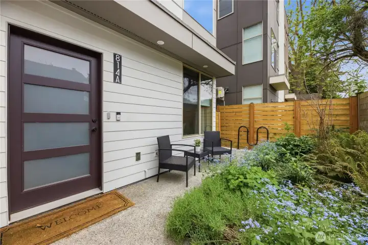 The only unit with a private entrance and a garden space to do whatever you would like! Bike racks to use with your 92 bike score.