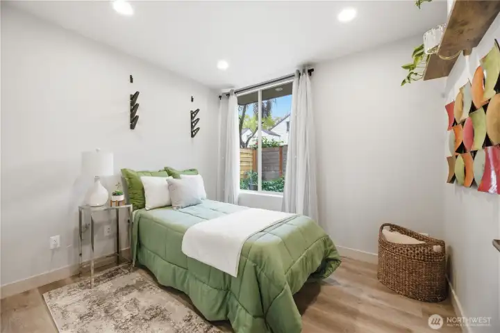 Downstairs bedroom with bathroom and shower.