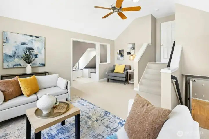 The large bonus room is accessbile from the main hallway upstairs or the back staircase