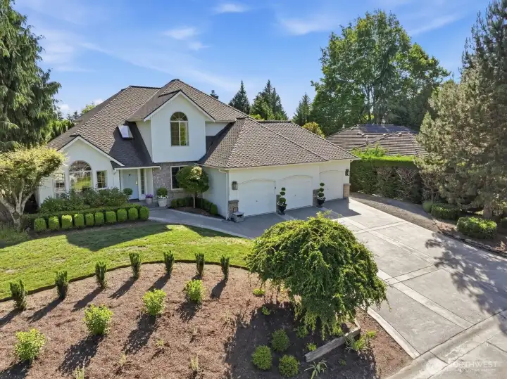 Beautifully reimagined European-inspired home where timeless architecture, quality construction, extraordinary craftsmanship and a serene, Versailles-like setting on over 1/3 of an acre.