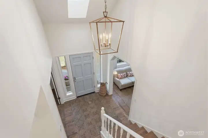 Ascend the stairs to the upper level.
