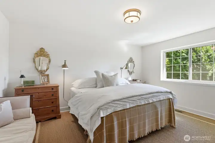 The primary suite with curated finishes that reflect a level of craftsmanship,