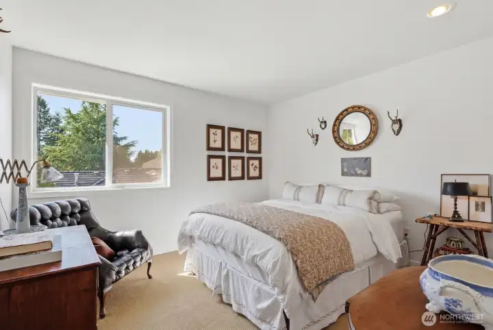 Bedroom 2 with wall to wall sisal carpet.