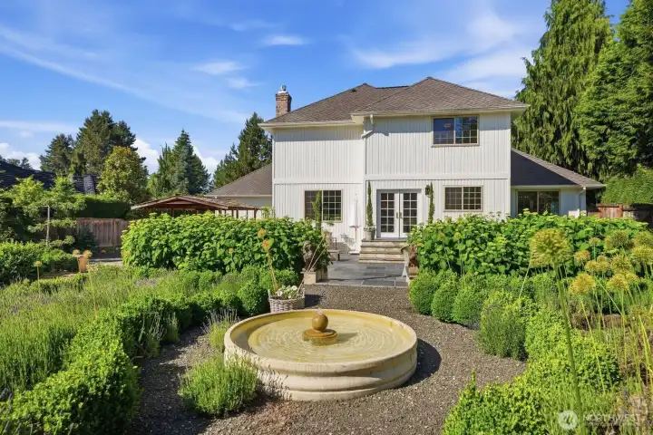 Enjoy a variety of fruit trees and bushes that adorn the yard with an Asian pear tree, Espalier Bartlett pear trees, raspberries, blueberries and rhubarb.