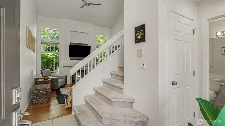 Enter into a light and bright foyer with vaulted living space Enter into a light and bright foyer with vaulted living space