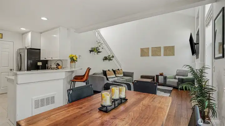 Spacious dining area just off the kitchen, eat up bar area for more casual dining Spacious dining area just off the kitchen, eat up bar area for more casual dining