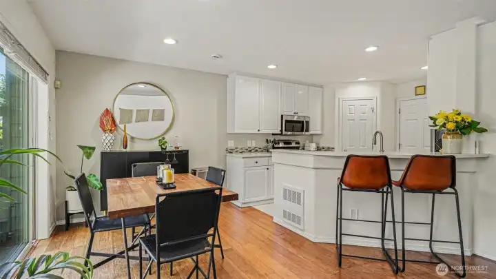 Light and bright kitchen with new vinyl plank flooring, stainless appliances and walk in pantry Light and bright kitchen with new vinyl plank flooring, stainless appliances and walk in pantry