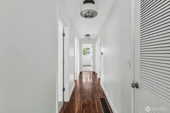 Hallway to 4 bedrooms on the main level