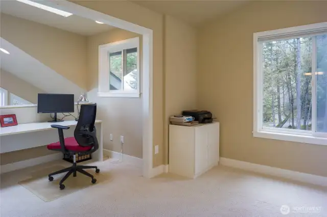 Looking out from bedroom to landing area which served as an office
