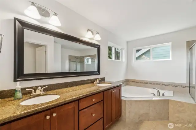 Oversized 5 piece primary bathroom.