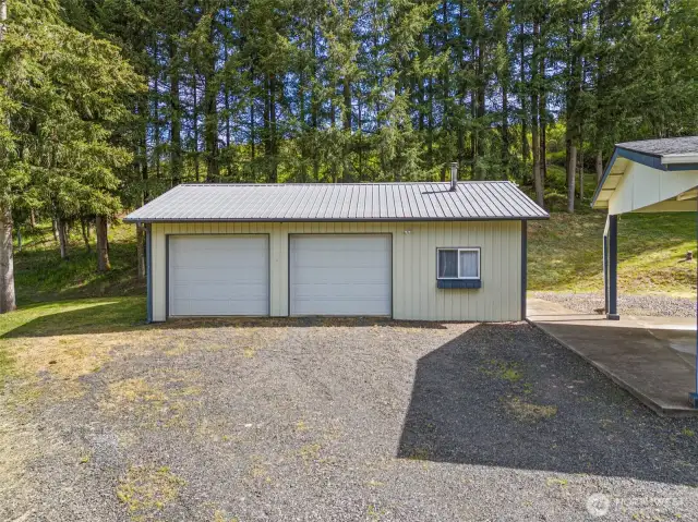 2 car garage with workshop area.