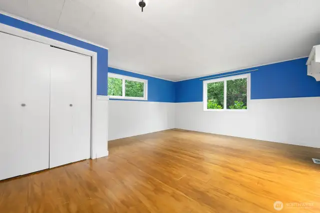The large, cheerful bonus room was updated in 2020 with new wainscotting, wood flooring and paint. This well-lit room would make an excellent rec room as it is large enough for a pool table!