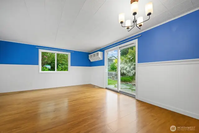 A new sliding glass door was added in 2021. It steps out onto a stone patio and stairs that were installed in 2017.