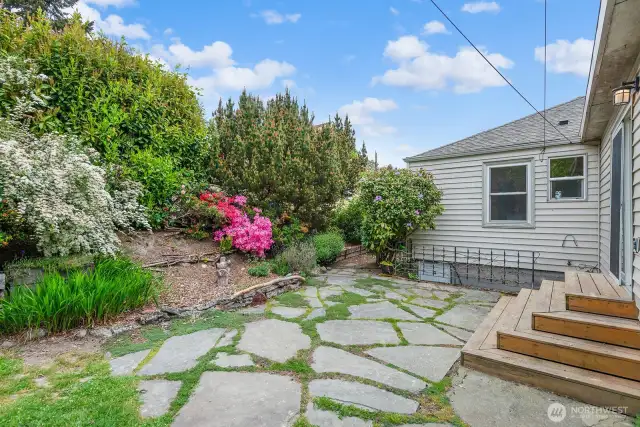 The garden is delightful and offers blooming plants and bushes everywhere you look.
