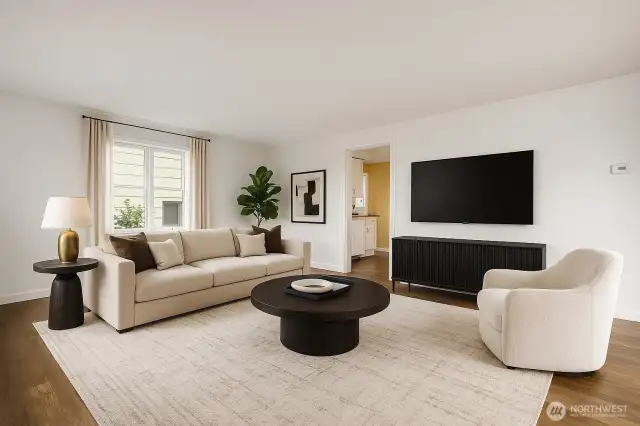 This is a virtually staged image of the living room to give you an idea of what can be done with the space.