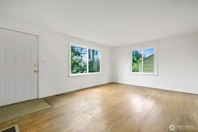 The east facing living room gets lots of natural light. All the windows in the house are new Anderson brand, installed in 2021.