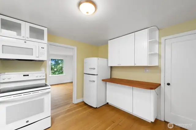 Step into the kitchen to enjoy another sunny, inviting room.