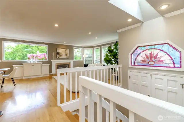 Custom stained glass windows at the entry.