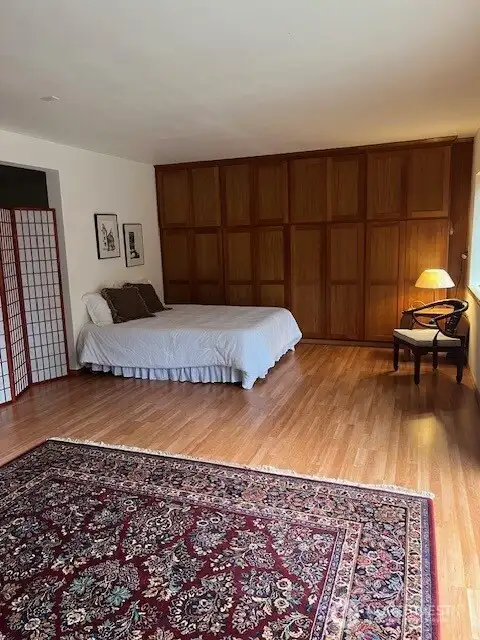 This bedroom is downstairs and is part of the Jack and Jill bedrooms that share the 3/4 bath