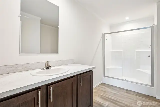 The primary bathroom suite.