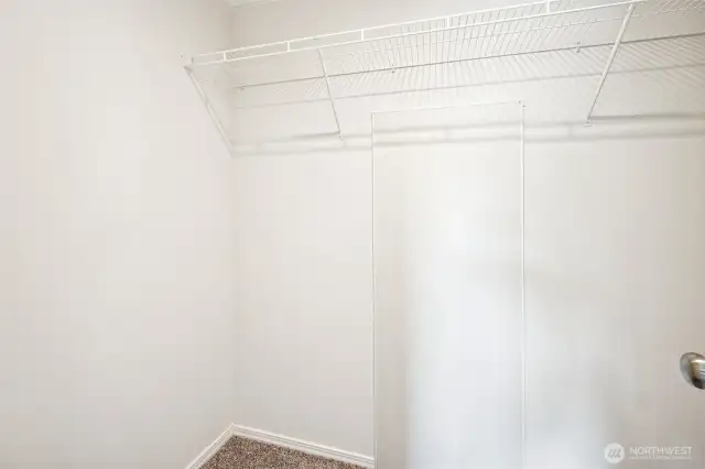The primary bathroom walk-in-closet.