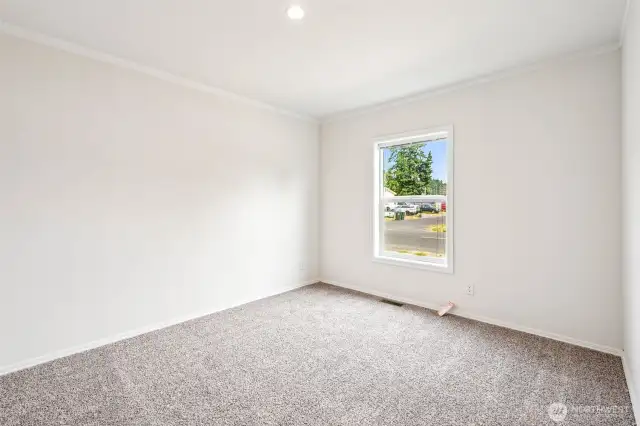 3rd bedroom looking out to the front yard.