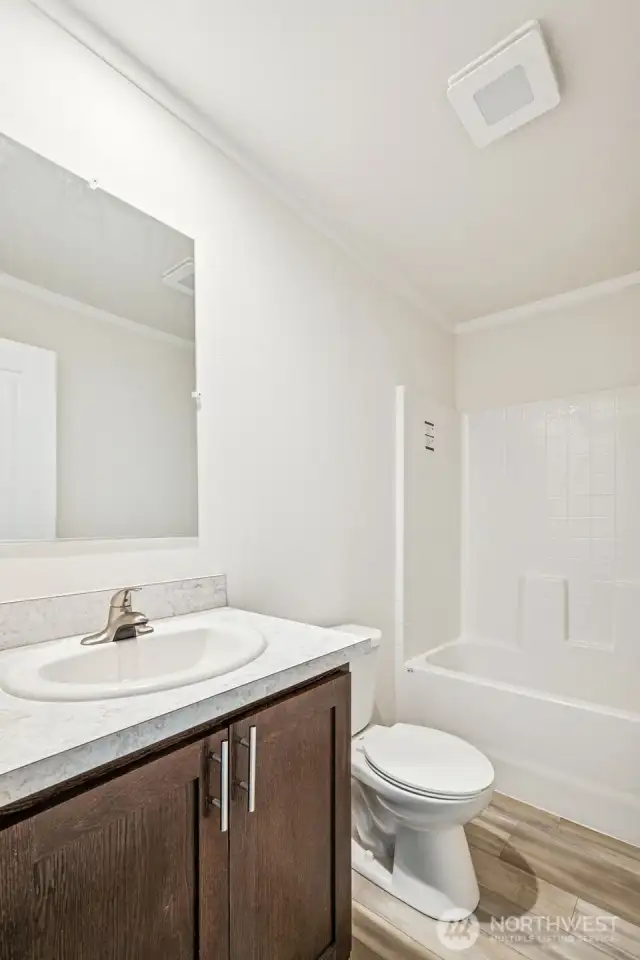Full bedroom that serves guests and the 2nd and 3rd bedrooms.