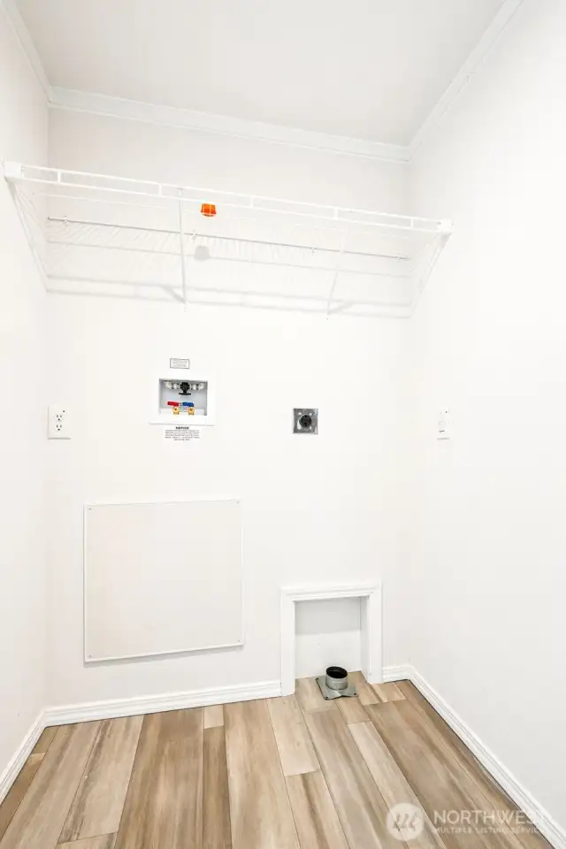 Laundry room is next to the back door.