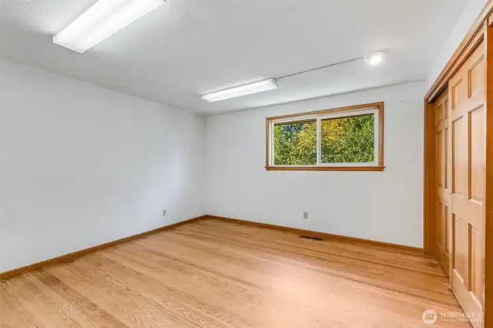 Bedroom #2 has beautiful wood floors and large closet
