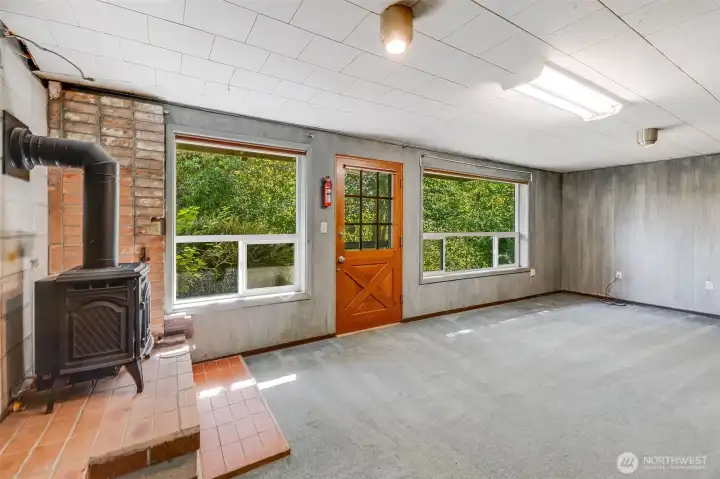 Downstairs is semi finished with exterior entrance and stand alone gas stove
