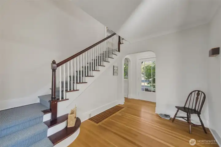 Unit A Entry way. New carpet runner on stairs.
