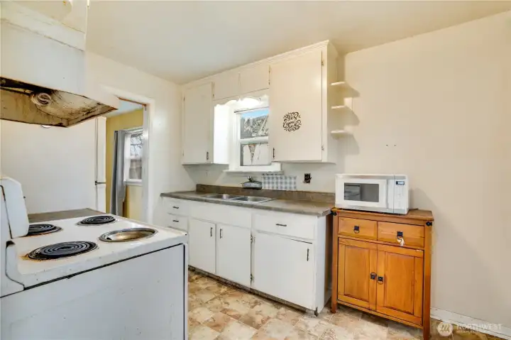 Additional cabinets provide storage options for your future design.