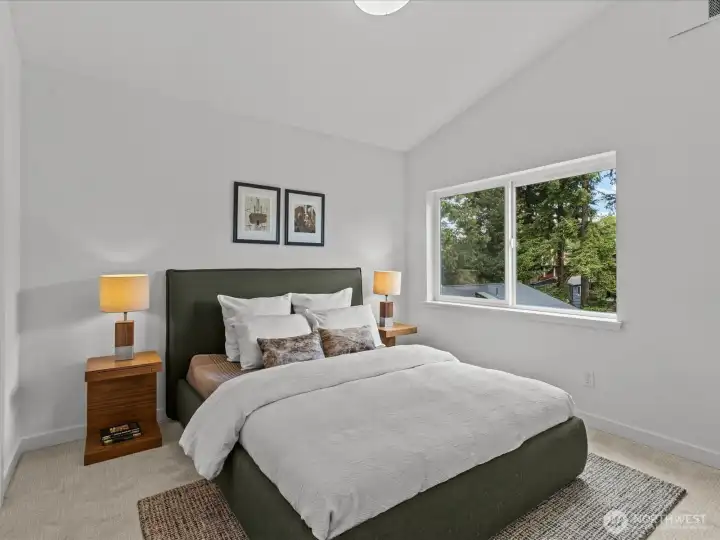 Spacious secondary bedroom on the upper level!  Model home.