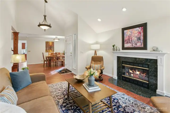 The living room, entry, and dining room flow together well, and give flexibility for a large gathering.