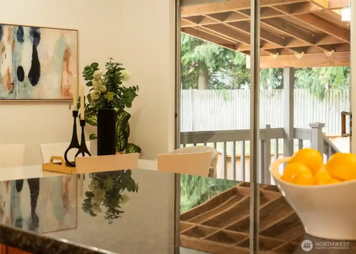 Setup the Barbee, it's grilling time! Accessing the backyard and covered deck via the dining room slider offers full access to the back yard.