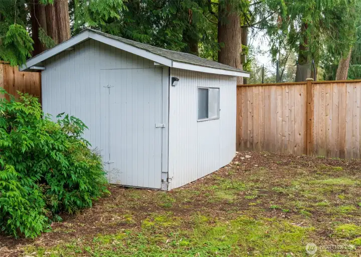 Storage? We've got storage! In addition to multiple small rooms for dry storage and an extra-tall 2-car garage,  you'll also have this garden shed for the yard tools.