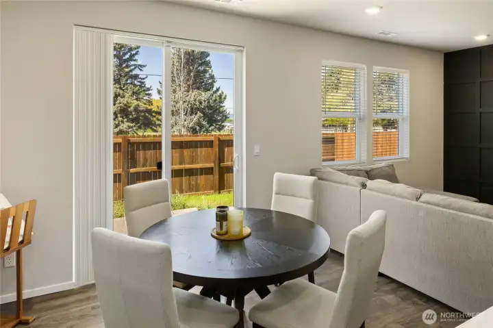 Views to the new backyard as you enjoy a meal and beautiful sunsets. (backyard installed after photos)