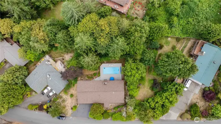 Overhead view of home and amazing backyard with in-ground pool. Overhead view of home and amazing backyard with in-ground pool.